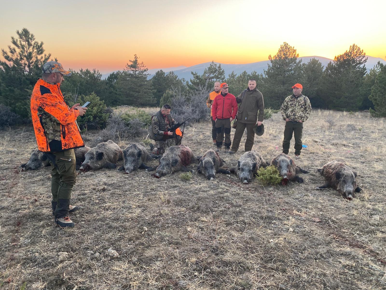 International hunters after a driven wild boar hunt in the mountains of Turkey