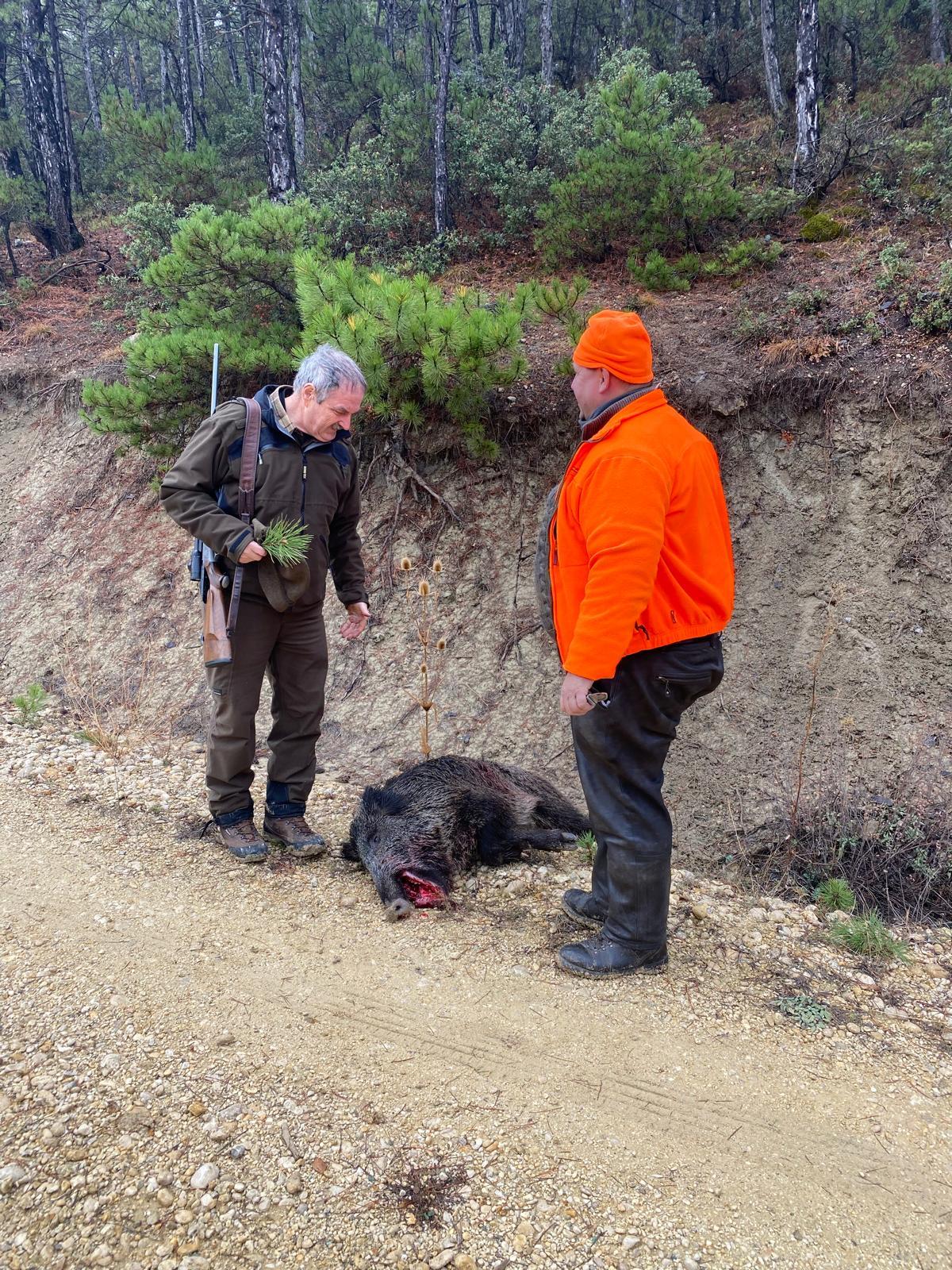 Licensed hunter and local guide with a rifle in a Turkish wild boar hunting area